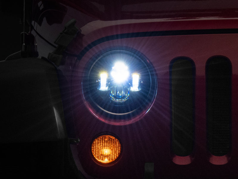 Raxiom 97-18 Jeep Wrangler TJ/JK Axial Series LED Daymaker Headlights- Black Housing (Clear Lens) - J108042 for 1997-2018 Jee