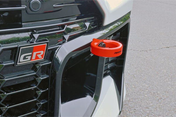 PERRIN 23-26 Toyota GR Corolla Front Tow Hook - Red - PTP-BDY-231RD by Perrin Performance - front view