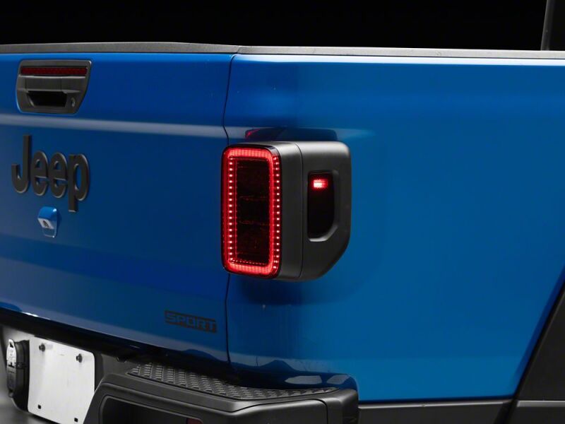 Raxiom 20-26 Jeep Gladiator JT Axial Series LED Tail Lights- Black Housing- Smoked Lens - JG24067 - front view