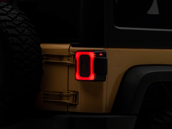 Raxiom 07-18 Jeep Wrangler JK Axial Series Carver LED Tail Lights- Blk Housing (Smoked Lens) - J164241 for 2007-2018 Jeep Wra