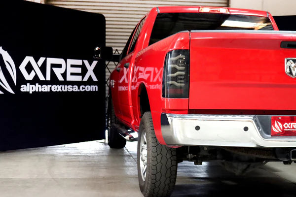 AlphaRex 09-18 Dodge Ram Luxx-Series LED Tail Lights Black w/ Activation Light &amp; Sequential Signal - 640004