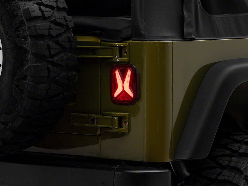 Raxiom 76-06 Jeep CJ7 Wrangler YJ &amp; TJ Gladiator LED Tail Lights- Blk Housing (Smoked Lens) - J177410