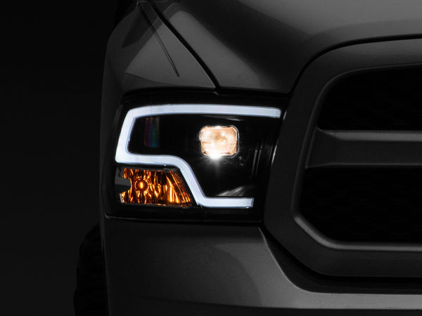 Raxiom 09-18 RAM 1500 LED Halo Projector Headlights- Black Housing (Clear Lens) - R111516 for 2009-2010 Dodge Ram 1500 - fron