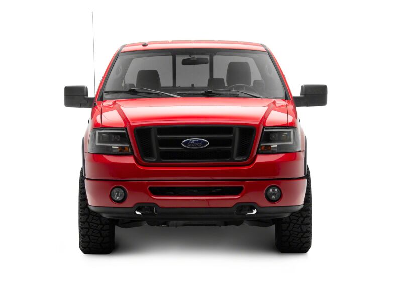 Raxiom 04-08 Ford F-150 Axial Series Projector Headlights- Black Housing- Clear Lens - T569352 - angle view