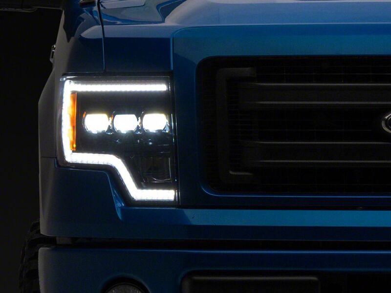 Raxiom 09-14 Ford F-150 CXR Series LED Projector Headlights- Black Housing- Clear Lens - T593907 - front view