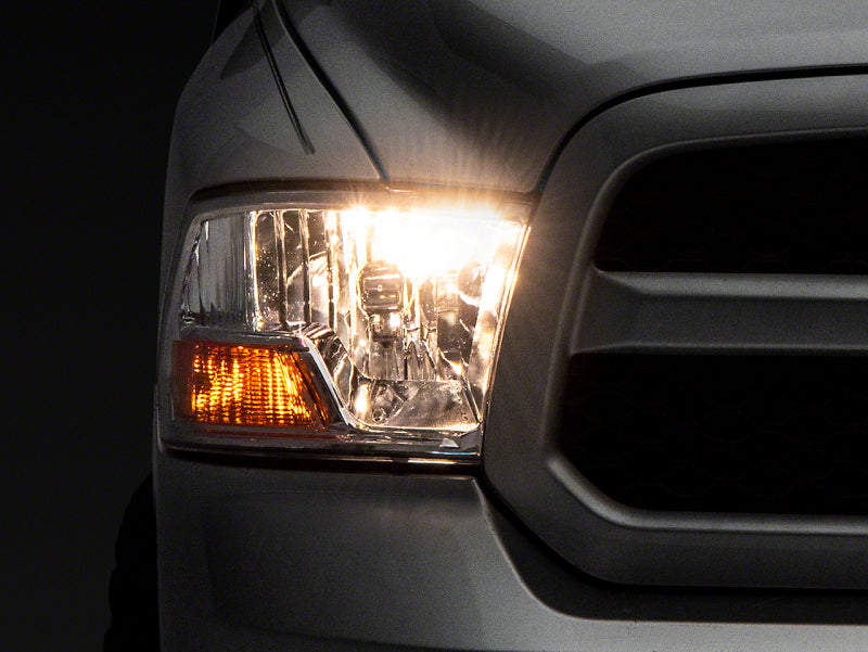 Raxiom 09-18 Dodge RAM 1500 Axial OEM Rep Headlights w/ Single Bulb- Chrome Housing (Clear Lens) - R118018