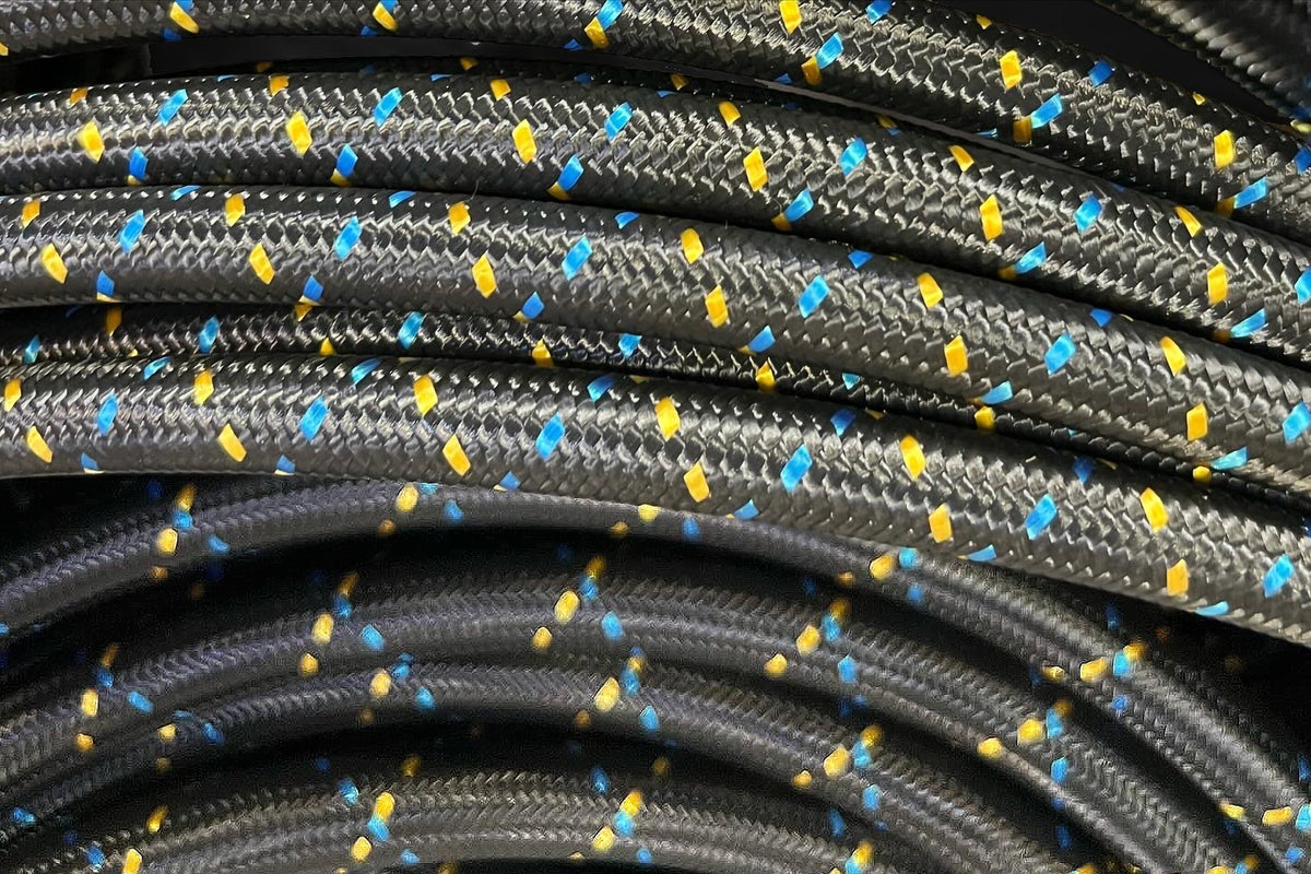 GReddy AN06 REUSABLE HOSE NYLON BRAIDED BLACK/GOLD/BLUE (PRICE PER FOOT) - 12850600