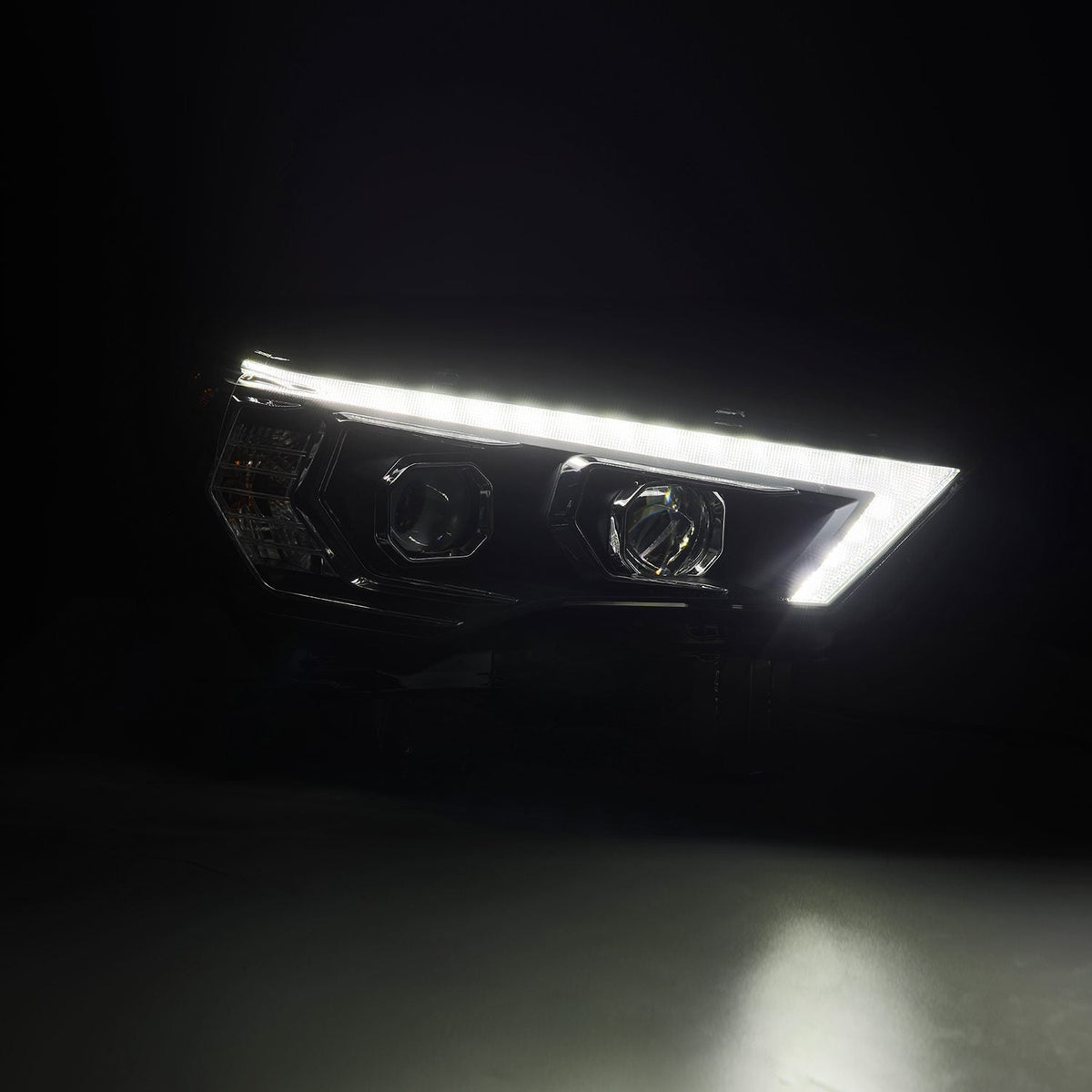 AlphaRex 14-22 Toyota 4Runner PRO-Series Projector Headlights Jet Black w/Seq. Sig. + DRL - 880816 by AlphaRex - angle view