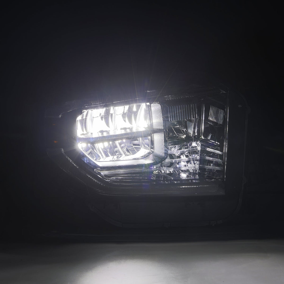 AlphaRex 14-21 Toyota Tundra MK II LUXX Series Crystal Headlights Alpha Black - 880830 by AlphaRex - close-up