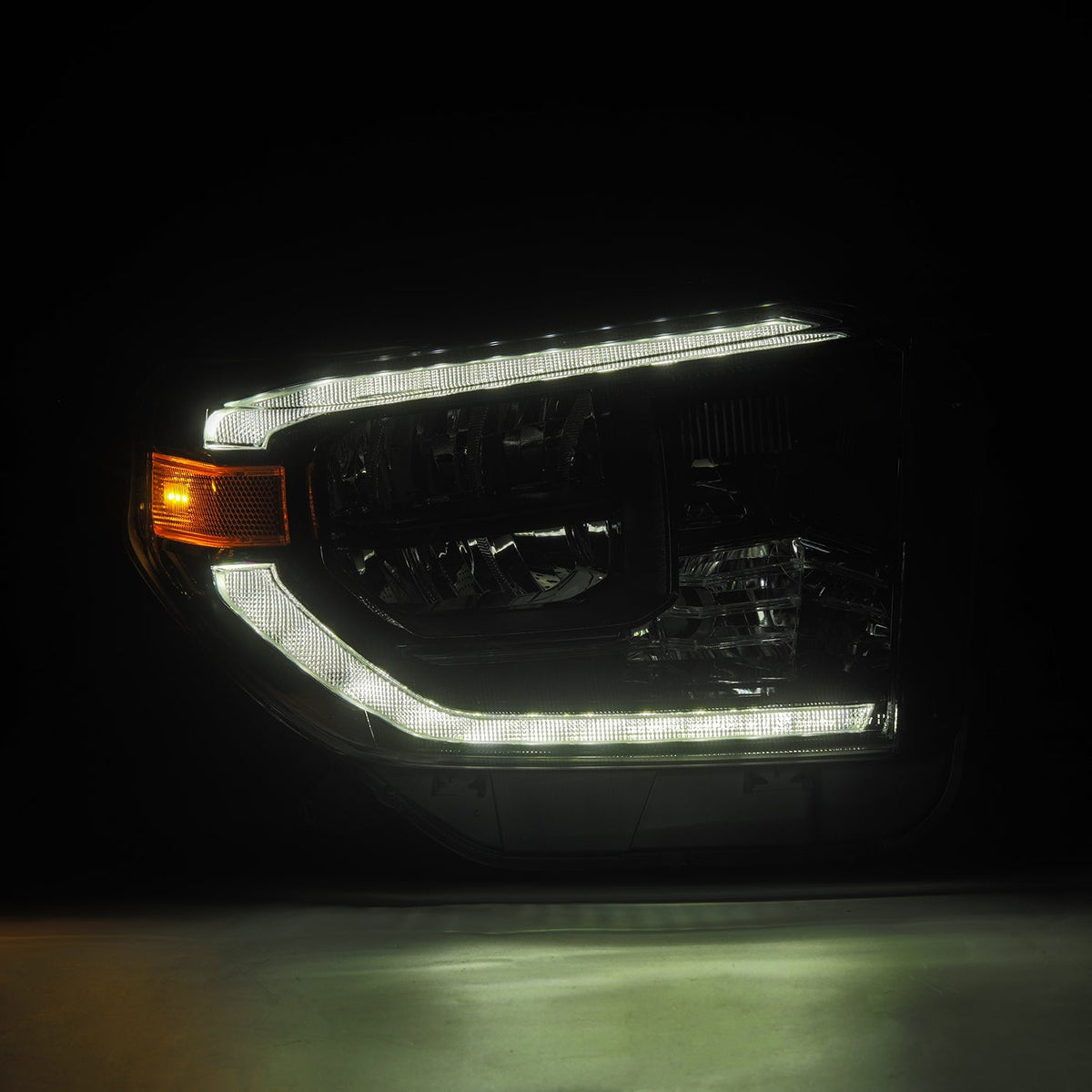 AlphaRex 14-21 Toyota Tundra MK II LUXX Series Crystal Headlights Alpha Black - 880830 by AlphaRex - angle view