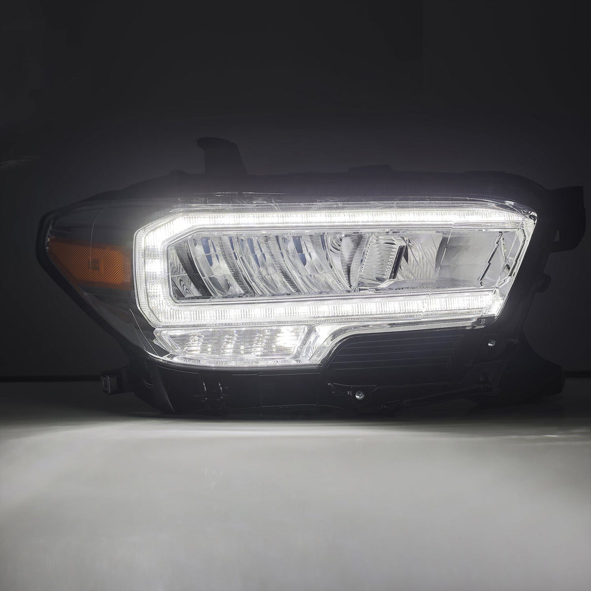 AlphaRex 16-23 Toyota Tacoma LUXX-Series Crystal Headlights - Chrome - 880703 for 2016-2023 Toyota Tacoma - angle view