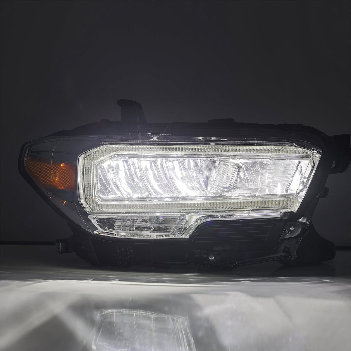 AlphaRex 16-23 Toyota Tacoma LUXX-Series Crystal Headlights - Chrome - 880703 for 2016-2023 Toyota Tacoma - close-up