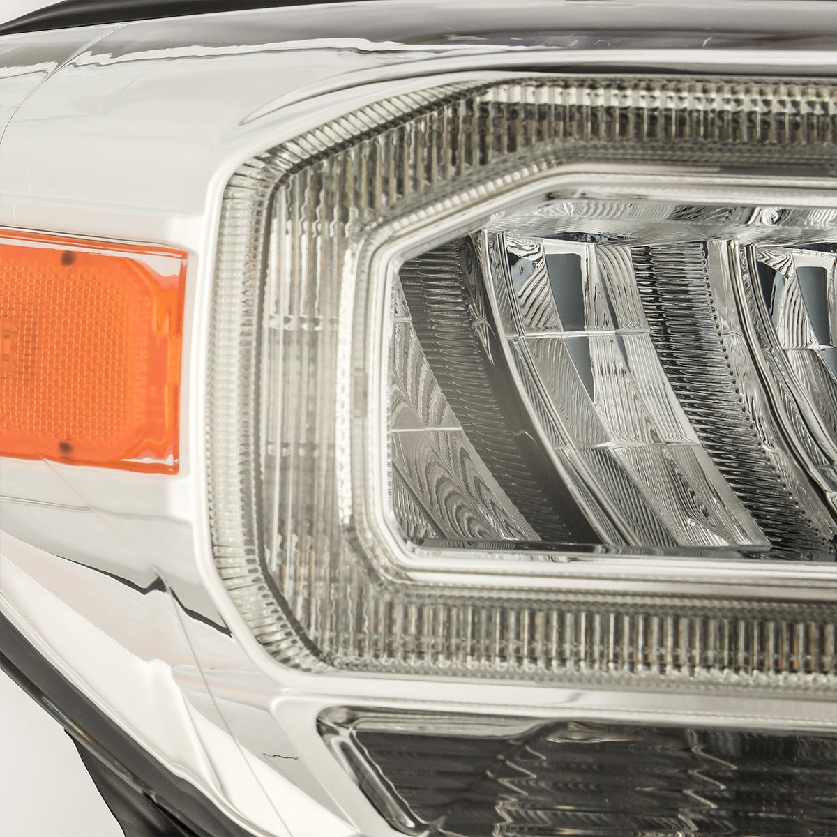 AlphaRex 16-23 Toyota Tacoma LUXX-Series Crystal Headlights - Chrome - 880703 for 2016-2023 Toyota Tacoma - side view