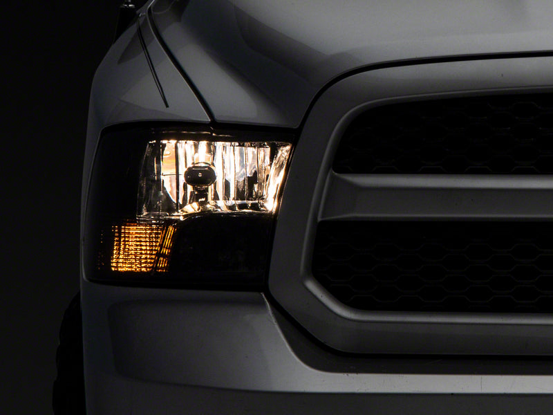 Raxiom 09-18 Dodge RAM 1500 Axial OEM Rep Headlights w/ Dual Bulb- Chrome Housing (Smoked Lens ) - R118021