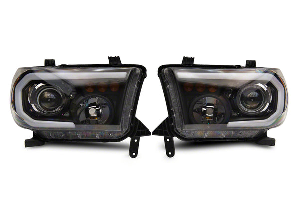Raxiom 07-13 Toyota Tundra Axial Projector Headlights w/ SEQL LED Bar- Blk Housing (Clear Lens) - TU16007 for 2007-2013 Toyot