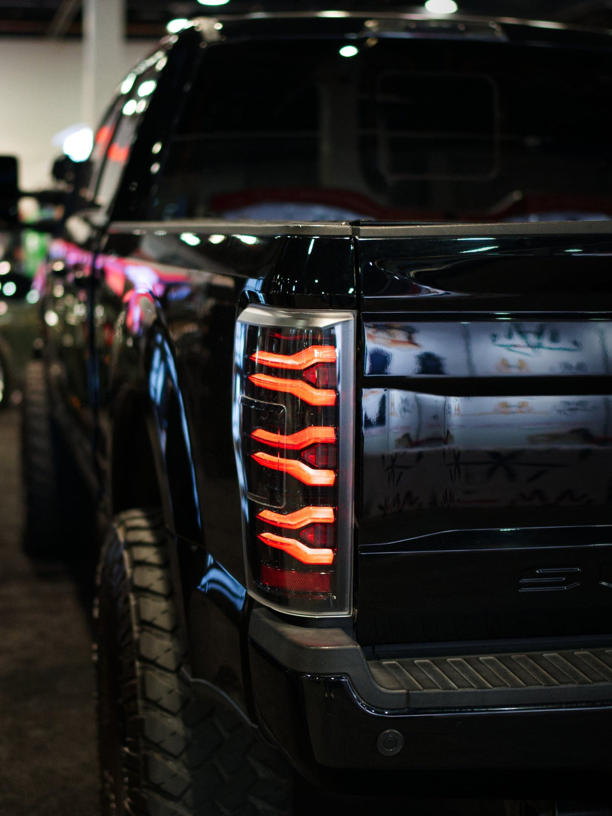 AlphaRex 17-19 Ford F150/F250/F350 LUXX LED Taillights - Alpha Black - 659090 for 2017-2019 Ford F 150 - side view