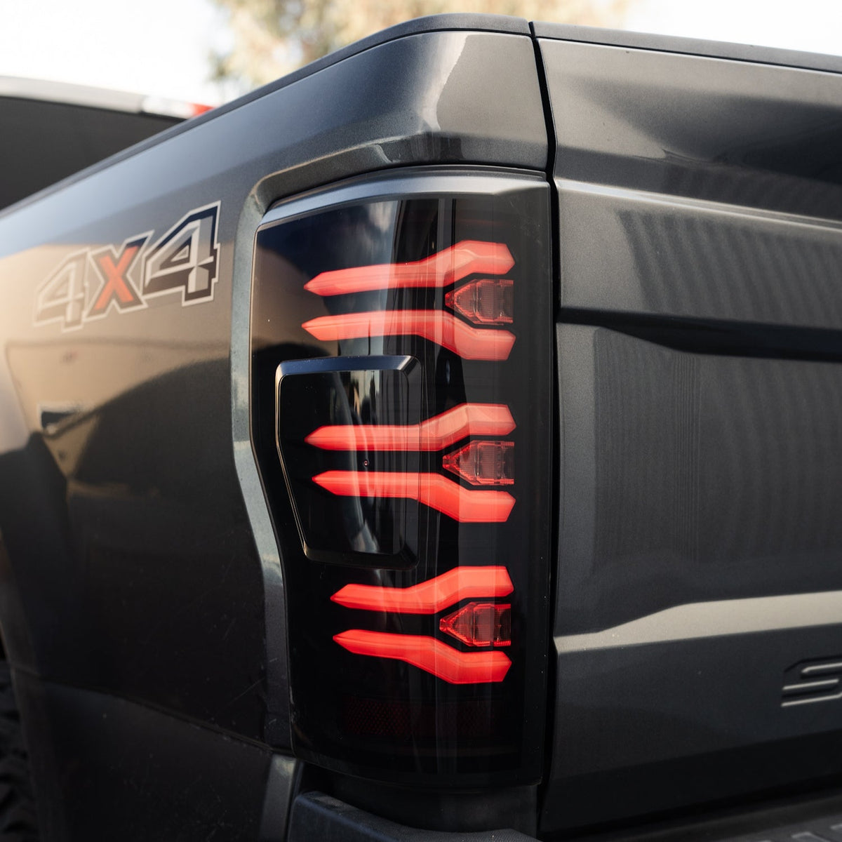 AlphaRex 17-19 Ford F150/F250/F350 LUXX LED Taillights - Black - 659091 for 2017-2019 Ford F 150 - front view