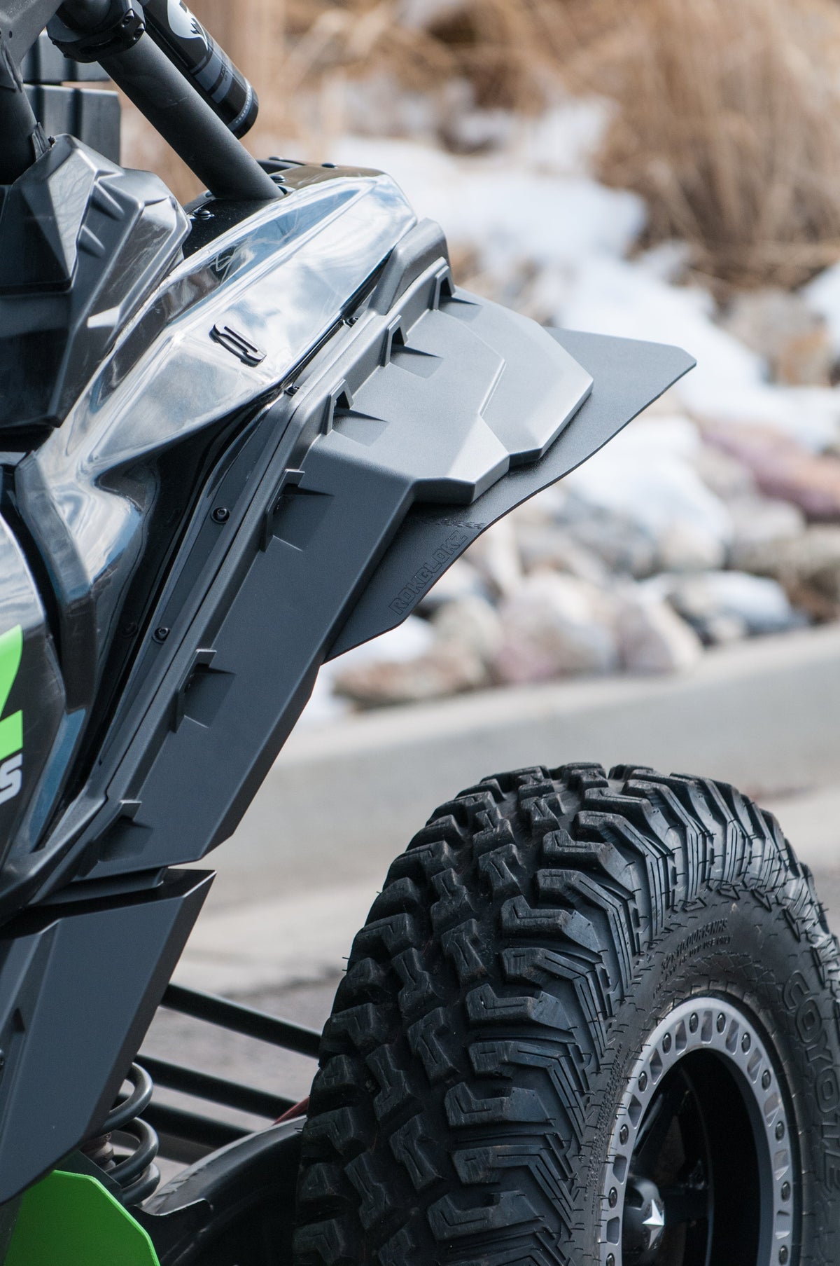 RokBlokz REAR fender extensions installed on a 2017+ Can-Am Maverick X3 with BRP fenders, providing protection from mud and debris