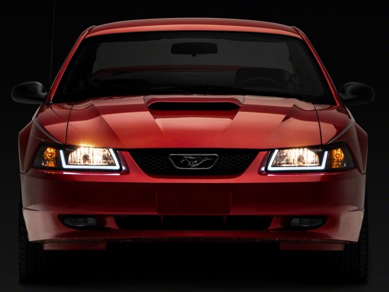 Raxiom 99-04 Ford Mustang Axial Series Headlights w/ LED Bar- Blk Housing (Clear Lens) - 422712