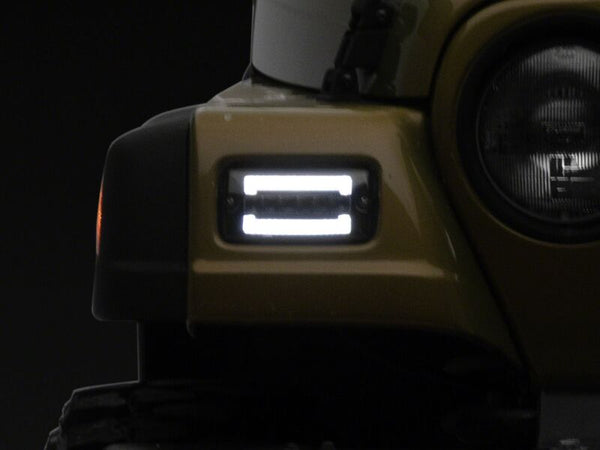 Raxiom 97-06 Jeep Wrangler TJ Axial Series LED Sequential Cornering Lights- Smoked - J211784 - front view