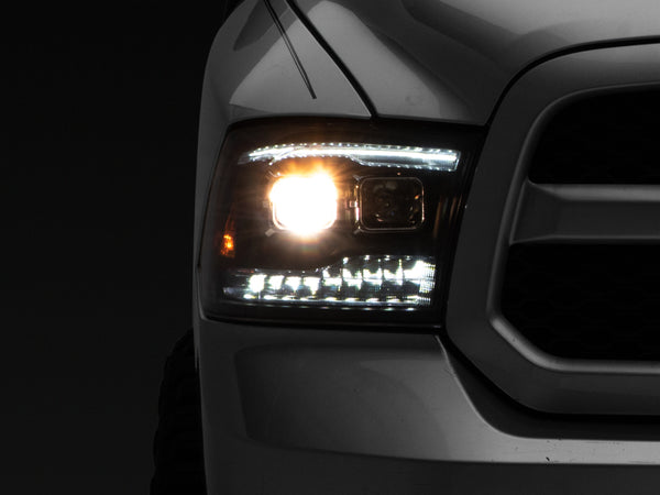 Raxiom 09-18 RAM 1500 LED Projector Headlights w/ Switchback Turn Signals- Blk Housing (Clear Lens) - R111520 for 2009-2010 D