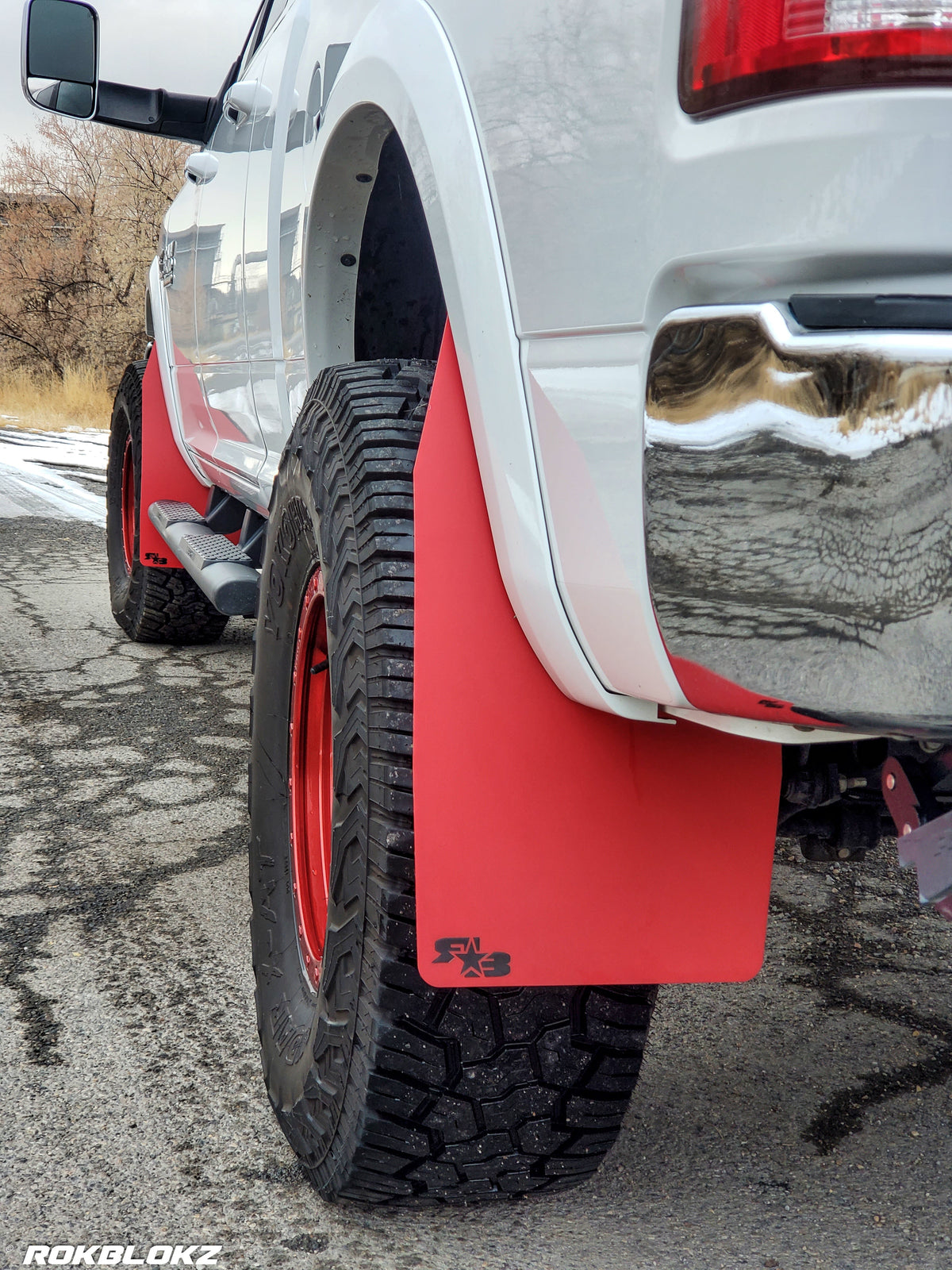 Ram 2500 Featuring XL Mud Flaps in Red