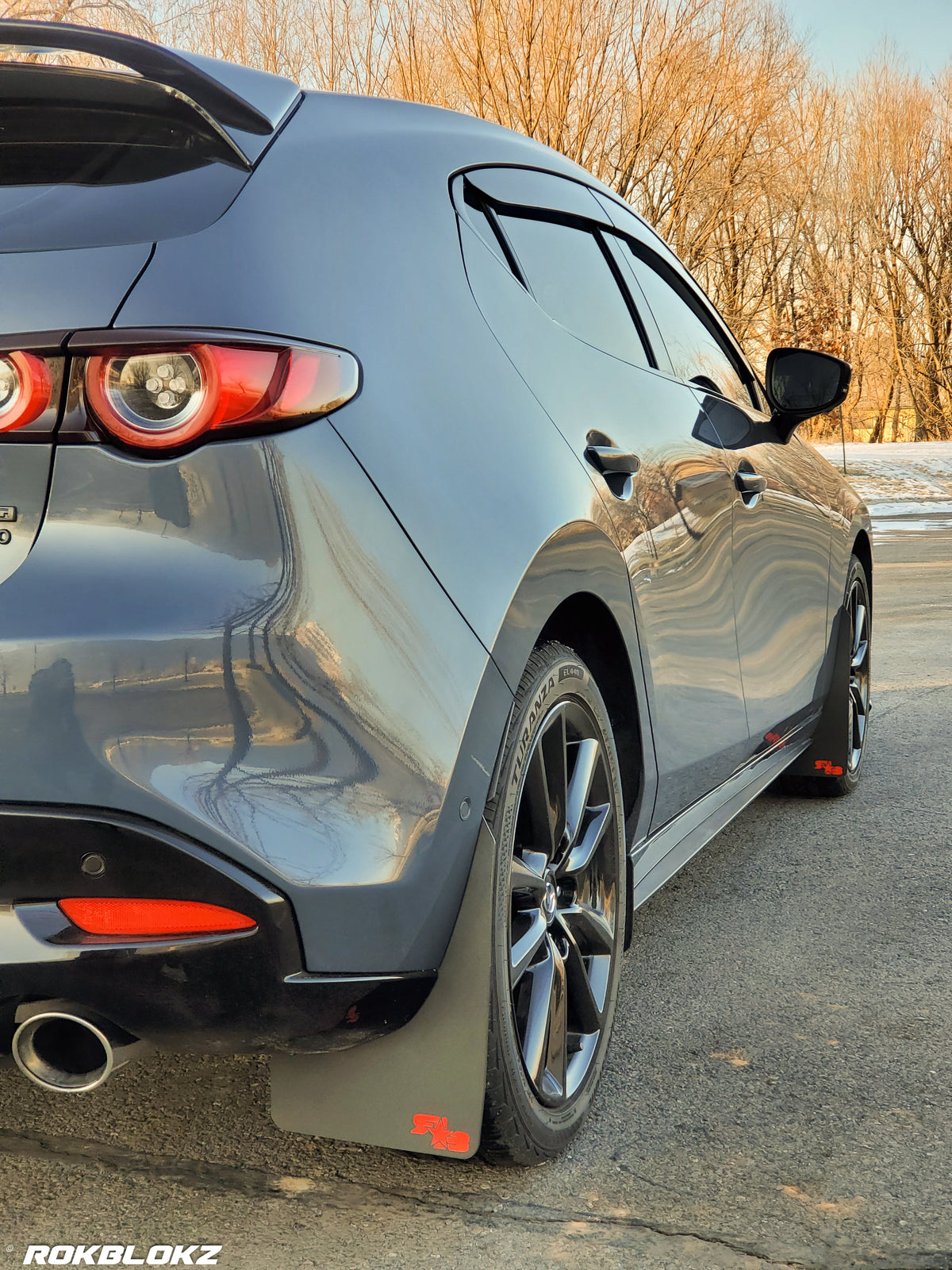 2021 AWD Mazda3 Turbo Featuring Rokblokz Mud Flaps in Black w/ red logo Original length