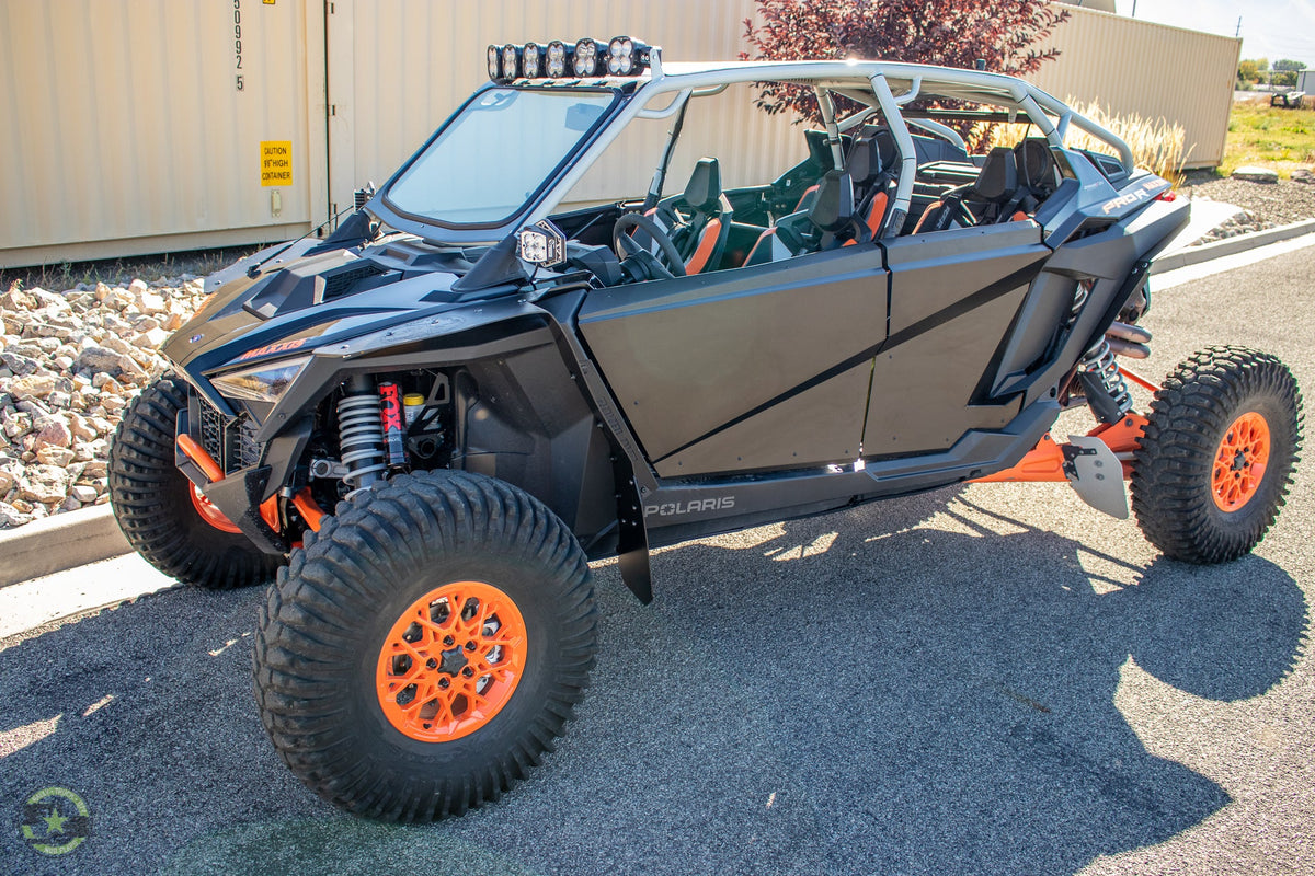 2022 Polaris RZR Pro R Launch Featuring Rokblokz Fender Kit in Black - front 3/4 view