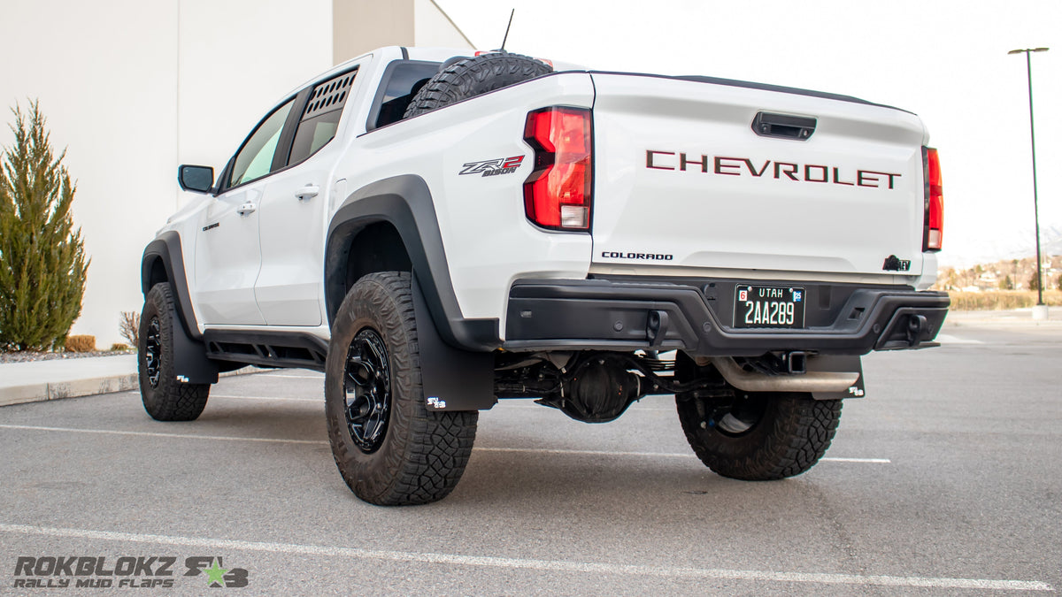 2023 Chevy Colorado ZR2 Bison featuring Rokblokz mud flaps - driver 3/4 view