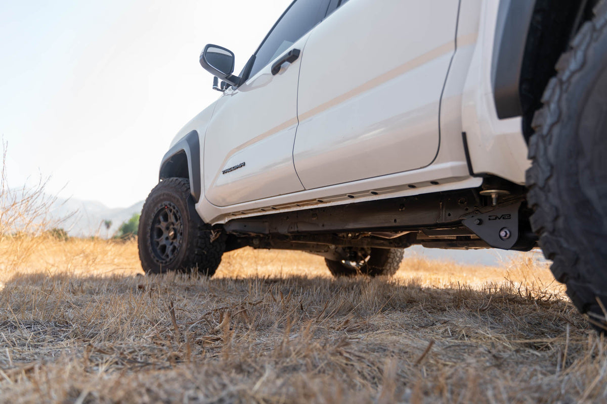 DV8 Offroad - 2024-2026 Toyota Tacoma | Trailing Arm Skid Plates - SPTT1-07