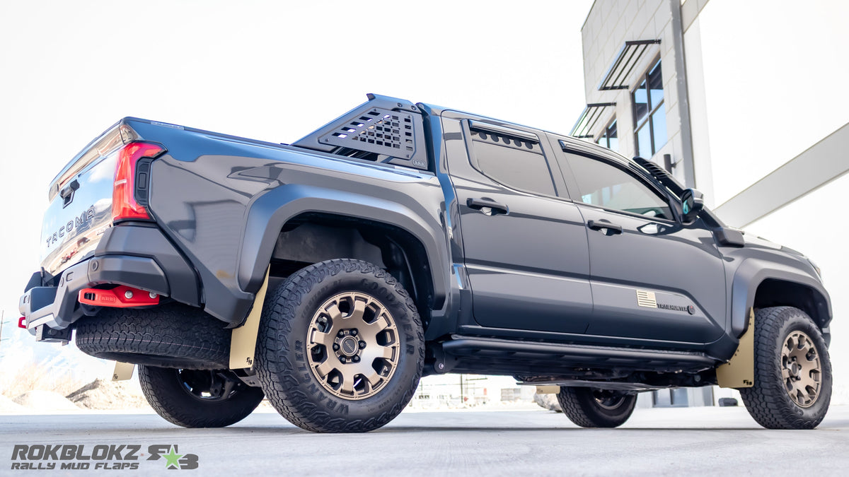 2024 Toyota Tacoma Trailhunter featuring ROKBLOKZ high-clearance mudflaps - PASS SIDE 3/4