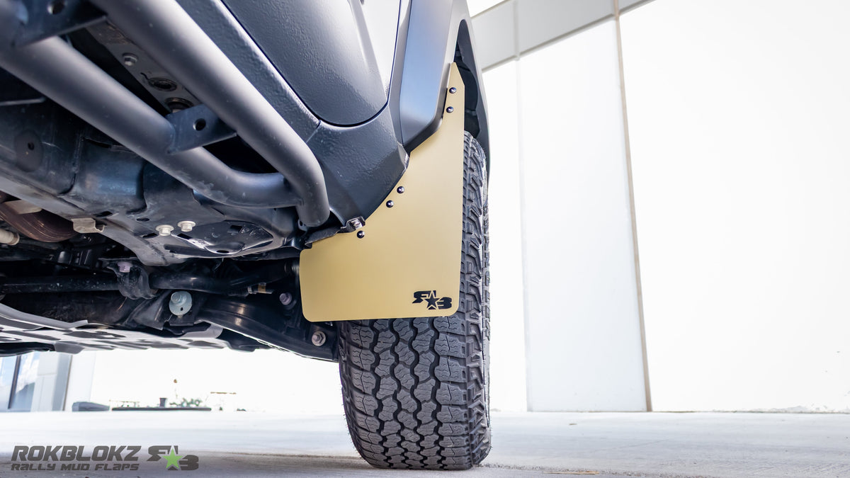 2024 Toyota Tacoma Trailhunter featuring ROKBLOKZ high-clearance mudflaps - FRONT 2