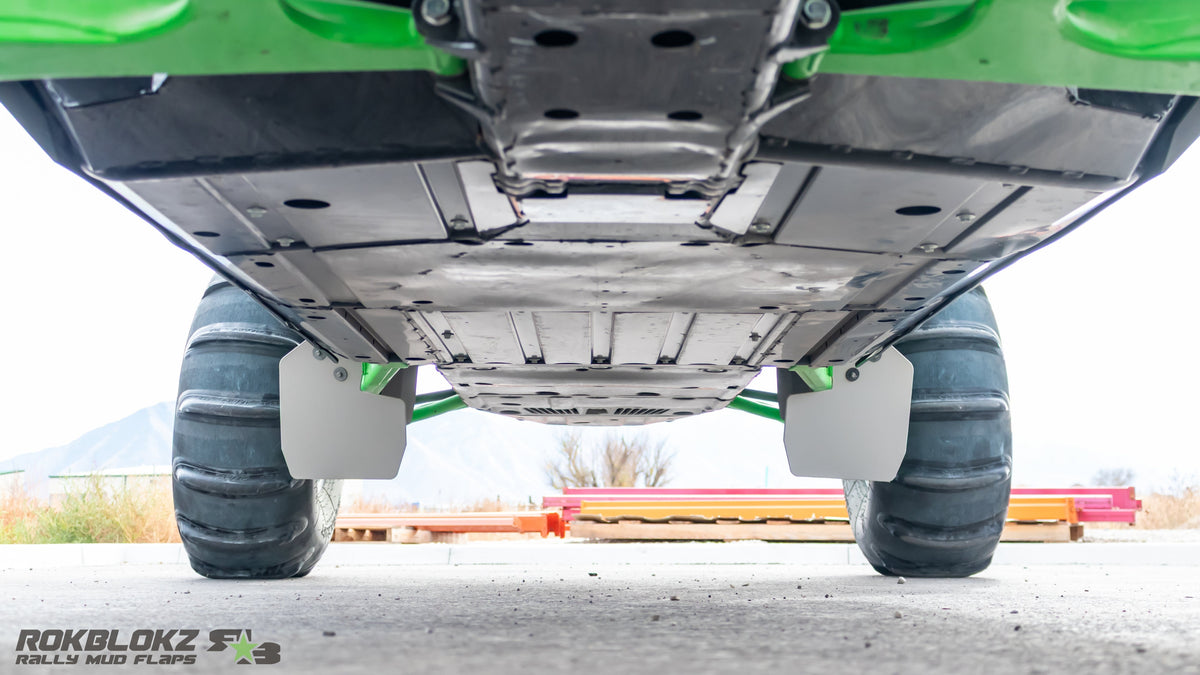 Underside view of Teryx H2 trailing arm with Rokblokz mud flap coverage