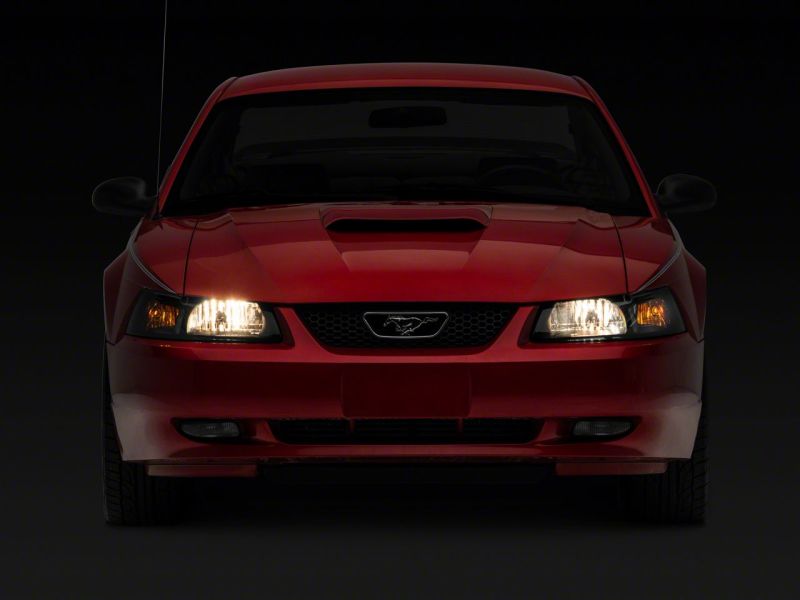 Raxiom 99-04 Ford Mustang Axial Series OEM Style Replacement Headlights- Blk Housing (Smoked Lens) - 413420