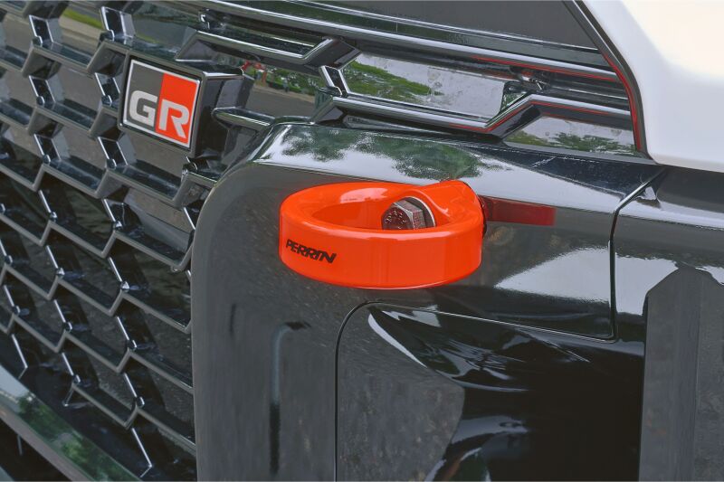 PERRIN 23-26 Toyota GR Corolla Front Tow Hook - Red - PTP-BDY-231RD by Perrin Performance - angle view