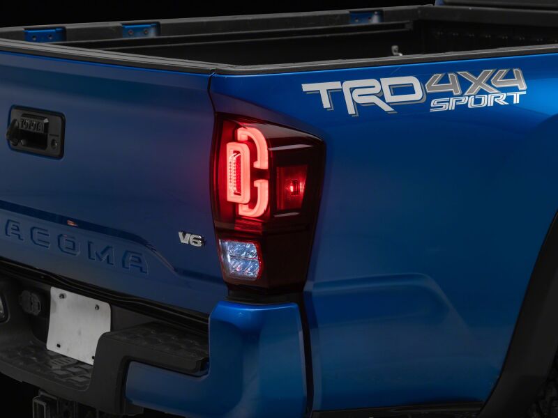 Raxiom 16-23 Toyota Tacoma XW Series Sequential LED Tail Lights- Black Housing- Red Lens - TT30332 - detail view