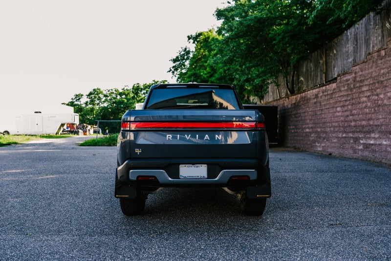 Rally Armor 22-24 Rivian R1T Black UR Mud Flap w/Tangerine Scream Logo - MF18-UR-BLK/TS