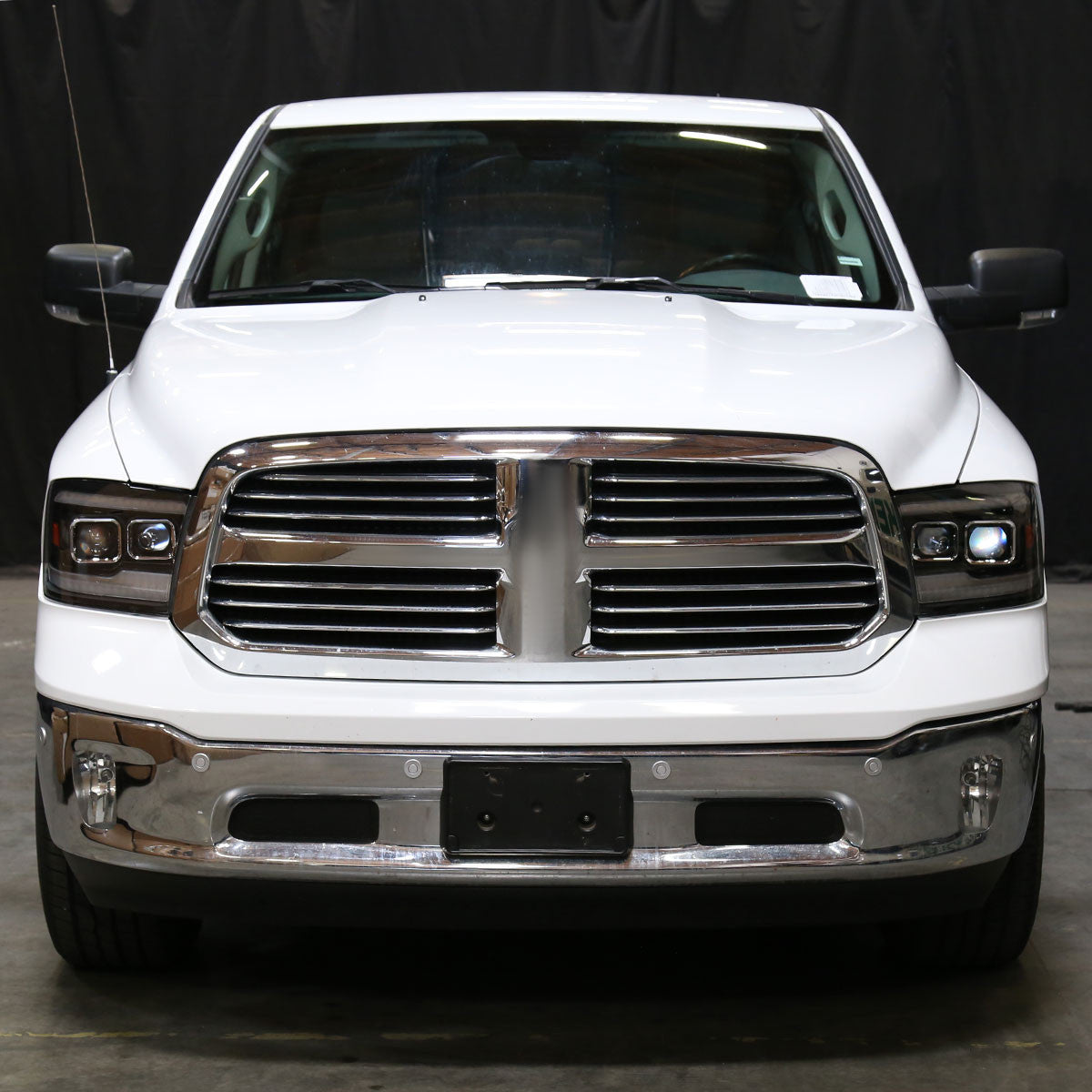 Spec-D Tuning - 2009-2018 Dodge RAM 1500  / 2019-2021 RAM Classic / 2010-2018 RAM 2500 3500 Switchback Sequential Projector Headlights (Matte Black Housing/Clear Lens) - 2LHP-RAM09JMG7-SQ-RS