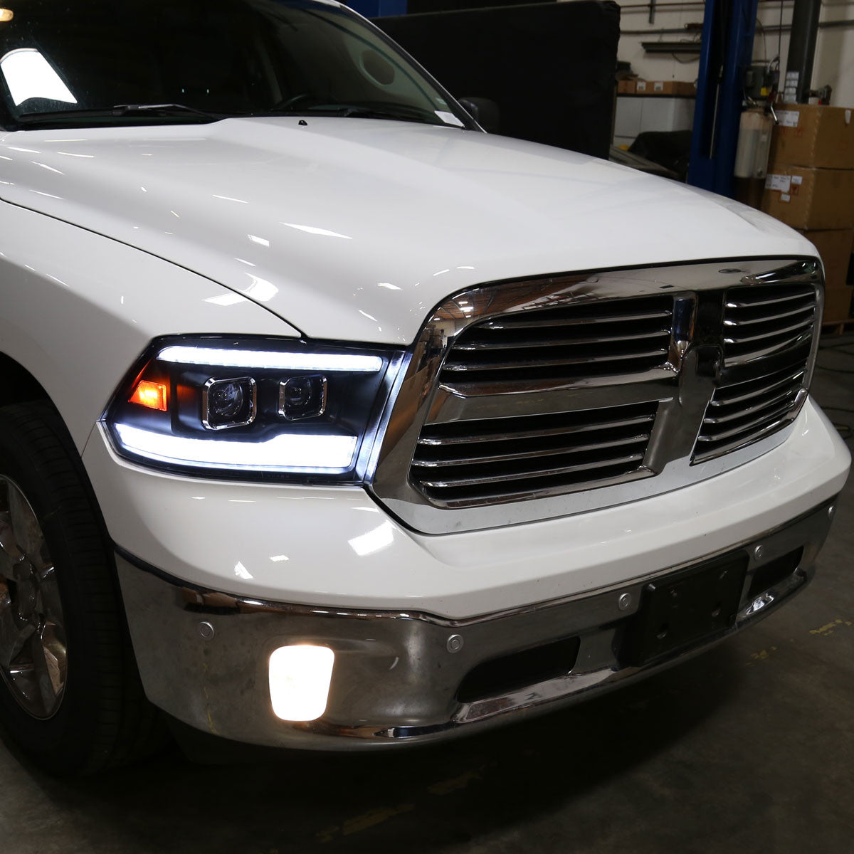 Spec-D Tuning - 2009-2018 Dodge RAM 1500  / 2019-2021 RAM Classic / 2010-2018 RAM 2500 3500 Switchback Sequential Projector Headlights (Matte Black Housing/Clear Lens) - 2LHP-RAM09JMG7-SQ-RS
