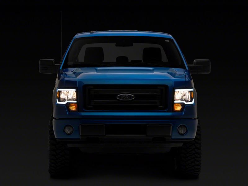 Raxiom 09-14 Ford F-150 Axial Series Headlights w/ LED Bar- Blk Housing (Clear Lens) - T566367