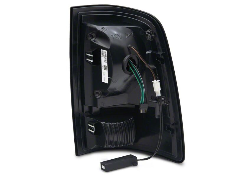 Raxiom 09-18 Dodge RAM 1500 Axial Series LED Tail Lights- Black Housing- Smoked Lens - R113540 - close-up view 2