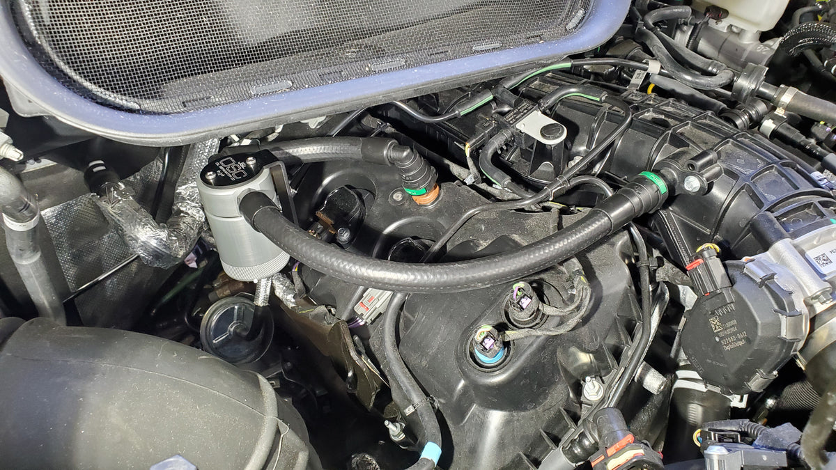 J&L 15-24 Ford Transit 150/250/350 3.5L EcoBoost Passenger Side Oil Separator 3.0 - Clear Anodiz - 3025P-C