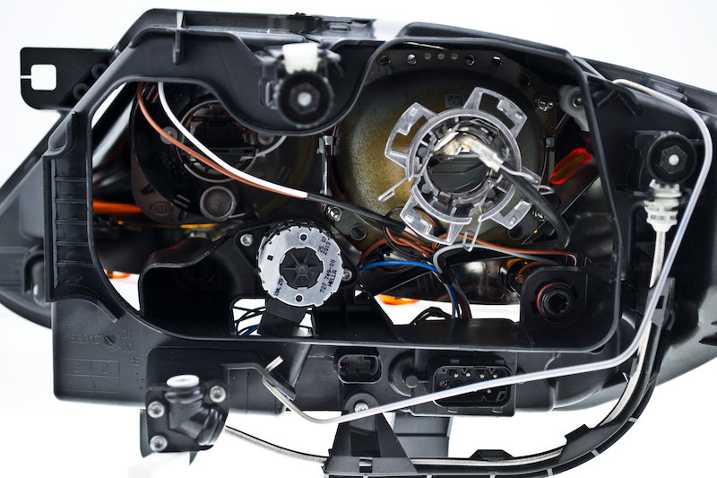 Hella 2003-2009 BMW Z4 Bi-Xenon Headlight Assembly - 247001561