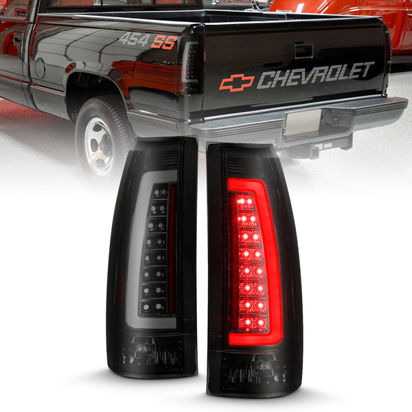 ANZO 1999-2000 Cadillac Escalade LED Taillights Black Housing Smoke Lens Pair - 311345 for 1994-1997 Chevrolet C2500 - front 