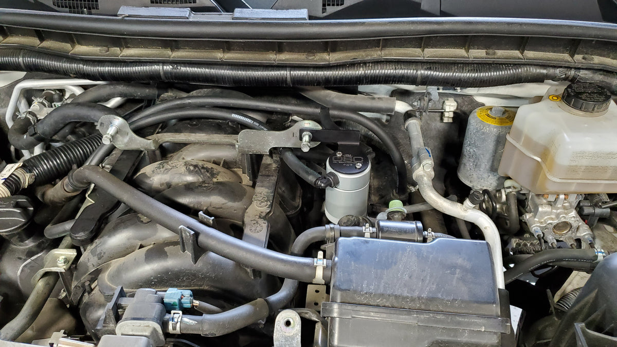 J&L 17-24 Nissan Armada / 14-24 Infiniti QX80 5.6L Driver Side Oil Separator 3.0 - Clear Anodize - 3118D-C
