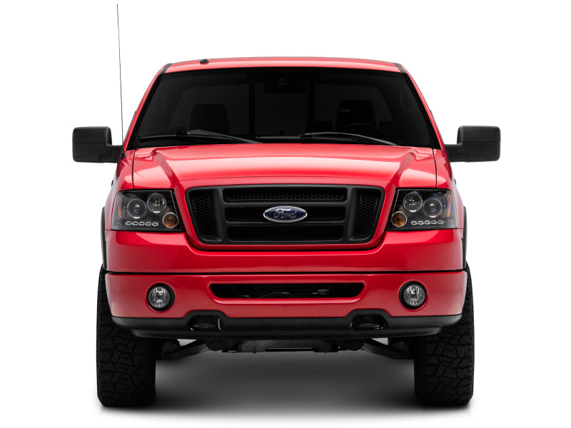 Raxiom 04-08 Ford F-150 Dual LED Halo Projector Headlights- Black Housing (Clear Lens) - T542827