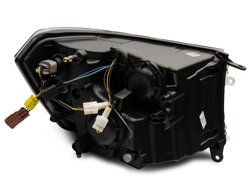 Raxiom 09-18 Dodge RAM 1500/2500/3500 Axial Headlights w/ SEQL LED Bar- Blk Housing (Clear Lens) - R131482