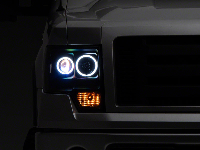 Raxiom 09-14 Ford F-150 Super White LED Halo Projector Headlights- Blk Housing (Clear Lens) - T542825