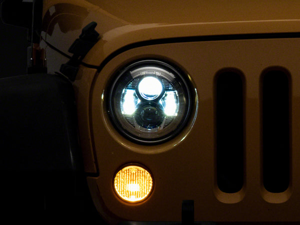 Raxiom 07-18 Jeep Wrangler JK 7-In LED Headlights- Chrome Housing (Clear Lens) - J154697 for 2007-2018 Jeep Wrangler - front 
