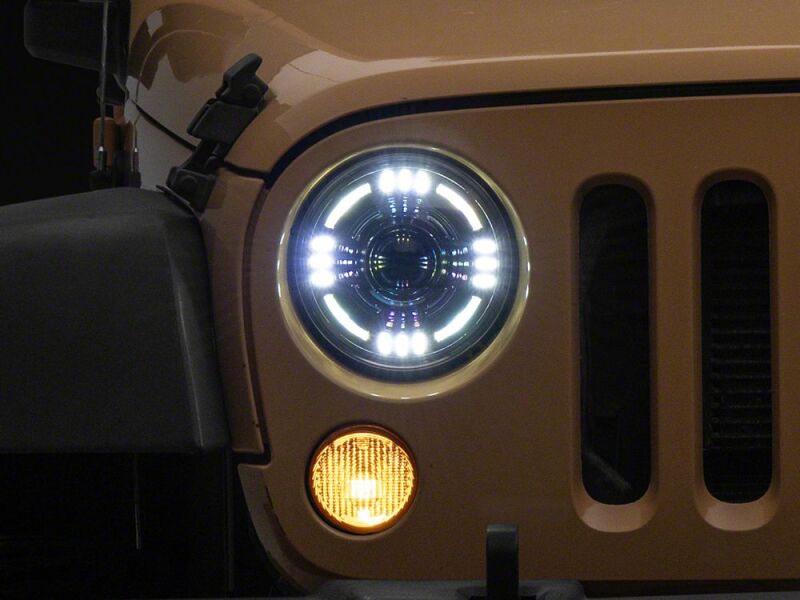 Raxiom 07-18 Jeep Wrangler JK Axial Series Quatro LED Headlights- Black Housing- Clear Lens - J194501 - close-up view 2